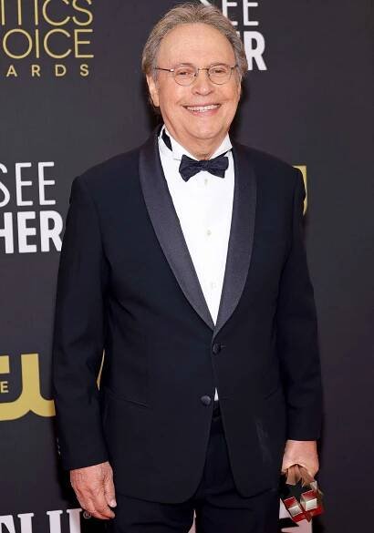 Honoree Billy Crystal, recipient of the Lifetime Achievement Award, poses in the press room during the 27th Annual Critics Choice Awards at Fairmont Century Plaza