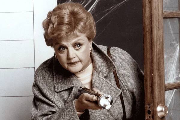 a-woman-investigates-with-a-flashlight-jessica-fletcher