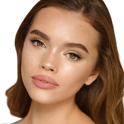 Hollywood Highlighter in Champagne Glow on medium-tone model