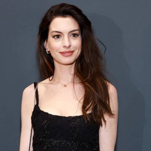 Anne Hathaway Wore "Alien Nails" to the Versace Runway Show — See Photos