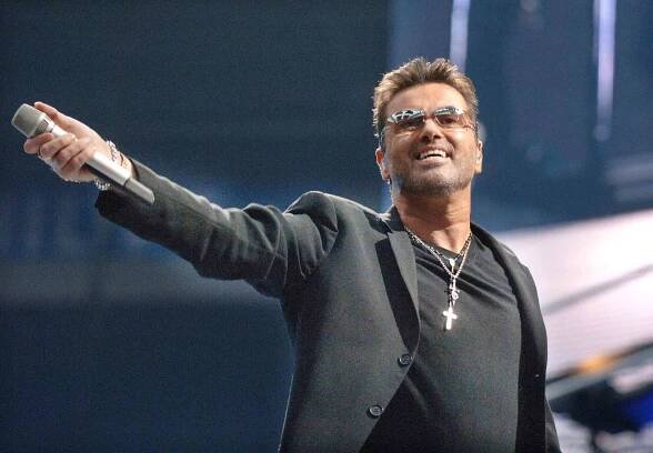 Photo of George Michael; performing live onstage at the Arena 