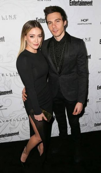 Hilary Duff (L) and musician Matthew Koma arrive at the Entertainment Weekly celebration honoring nominees for The Screen Actors Guild Awards at the Chateau Marmont on January 28, 2017 in Los Angeles, California