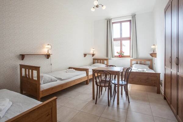 Postel nebo postele na pokoji v ubytování Penzion a restaurace U Hájků