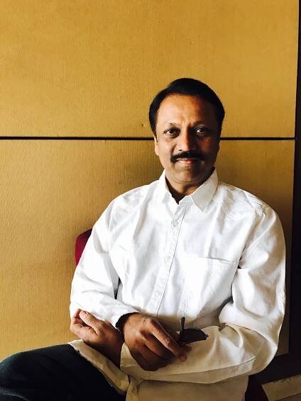 Ashok Kumar | Portfolio | Seated Shot