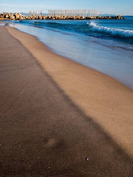Golden sands of El Perellonet Recatí Beach