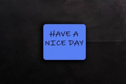Blue paper card with words Have Nice Day on black background. Positive message and inspirational phrase. Motivation for spending good day — Stock obrázek