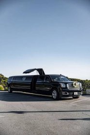 Black GMC Denali Limousine |15 Passenger SUV