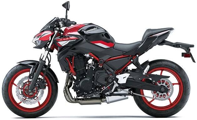 Side angle of a motorcycle staged in a white studio background.