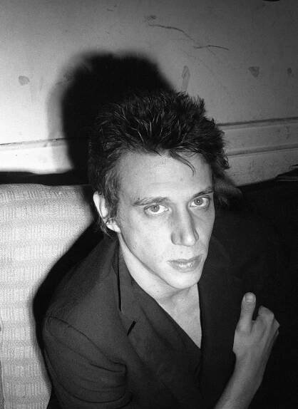 A blackandwhite photo of a young Richard Hell.