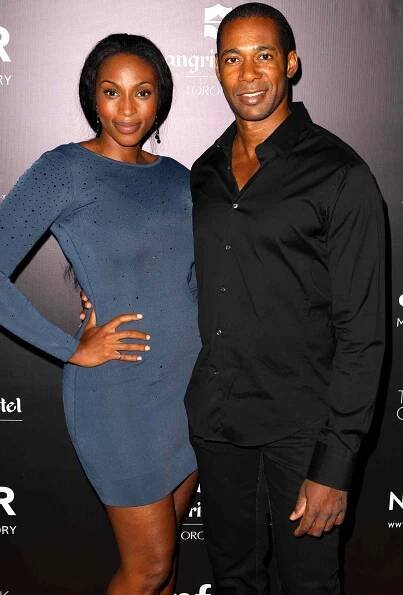 Lisa Berry (L) and Dion Johnstone attend amfAR Cinema Against AIDS TIFF 2012