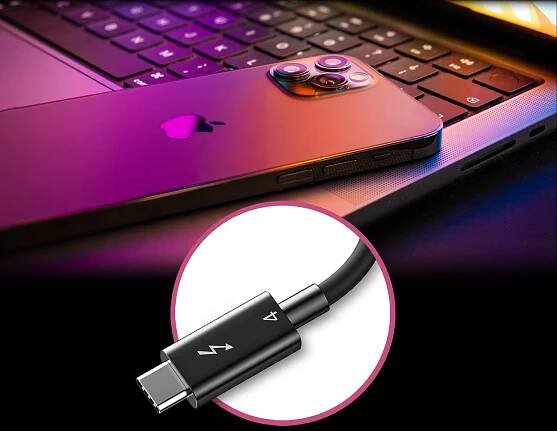 MacBook Pro with iPhone and Thunderbolt 4 Cable