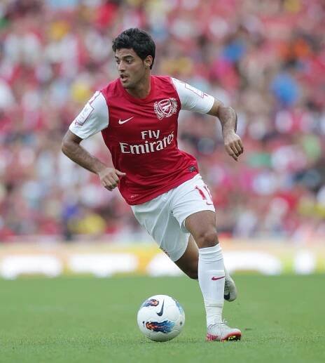 Carlos Vela, Arsenal FC player, dribbling the ball.