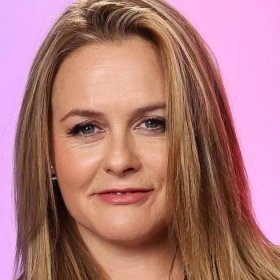 Alicia Silverstone, 47, poses in plunging blazer for shoot as famous Clueless actress has barely aged...