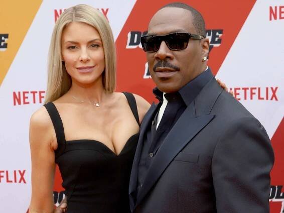 Paige Butcher and Eddie Murphy attend the "Dolemite Is My Name" premiere presented by Netflix on September 28, 2019 in Los Angeles, California.
