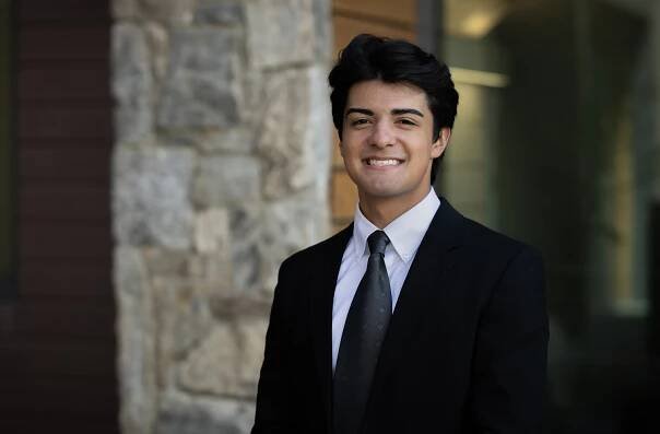 Aaron Hoyle-Rivera poses for photo on campus at WCU