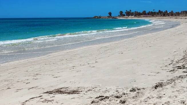 Wonderful view of the lagoon, seashore, white sand beach and blue sea. Djerba Island, Tunisia