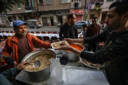 In pictures: Egypt’s Ramadan tables provide iftar for increasing numbers of people in need
