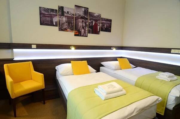Postel nebo postele na pokoji v ubytování Hotel Uno