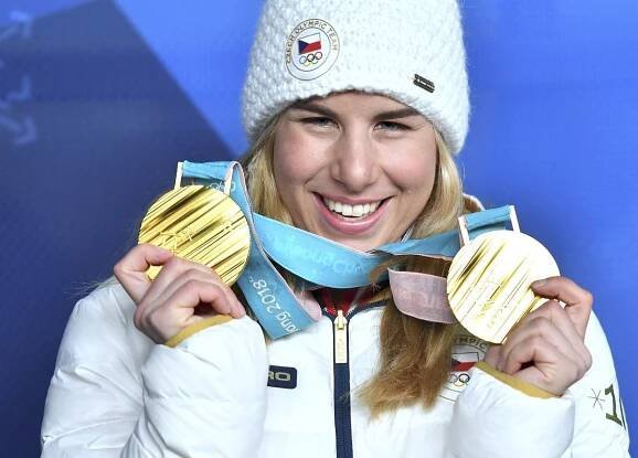 Ester Ledecká metál od Zemana přijme, ale na Hrad nedorazí. Řešila to i s tátou