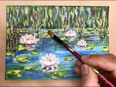 someone is painting water lilies in the pond