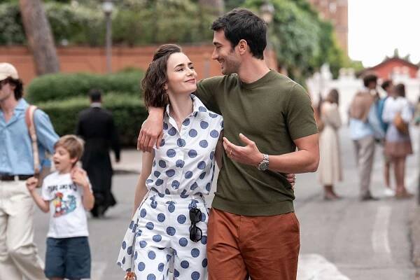 Lily Collins as Emily, Eugenio Franceschini as Marcello in Emily in Paris.