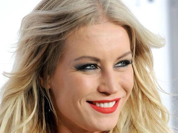 Denise Van Outen shimmies in disco mini dress