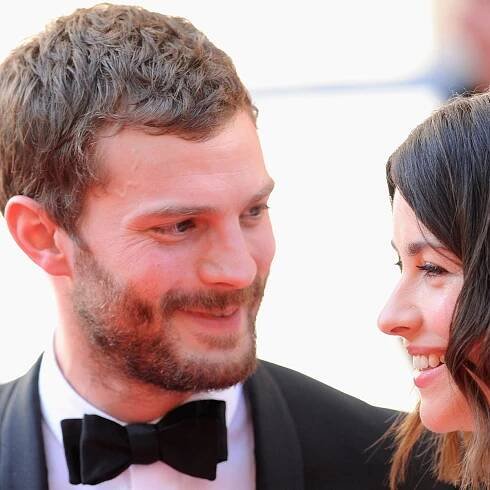 Jamie Dornan chokes up as he speaks about marriage to Amelia Warner