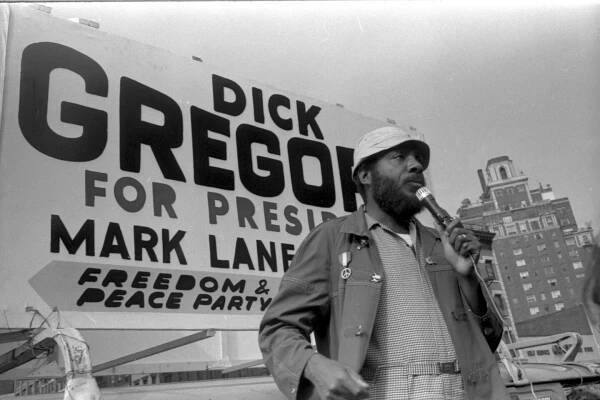 Comedian and social activist Dick Gregory campaigns for president in New York in 1969.