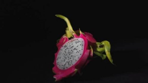 Video rotující exotické ovoce na černém pozadí — Stock záběr
