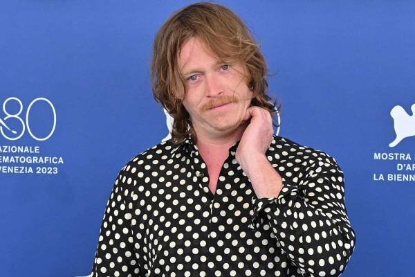 Caleb Landry Jones Tests Out Scottish Accent for Upcoming Movie During Venice Press Conference