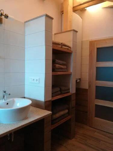Koupelna v ubytování Apartmány U Holubů