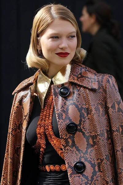 Léa Seydoux’s Curled Bob and Brick Red Lips at Miu Miu