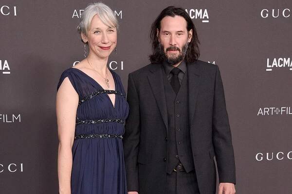 Keanu Reeves holds hands with rumored girlfriend Alexandra Grant
