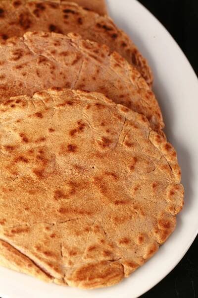 4 cassava flour paleo / AIP flatbreads on a white plate.