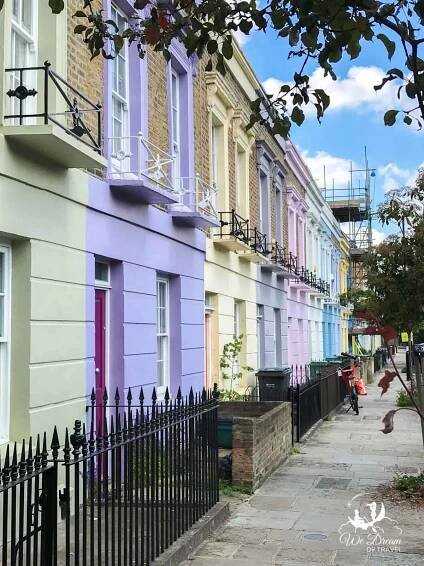 A row of vibrant colourful terraced houses in Hartland Road, Camden Town, London