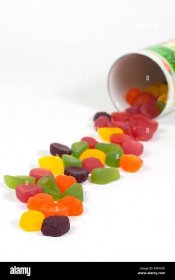 Colorful candies piled up on a table Stock Photo