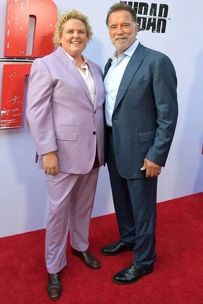 Fortune Feimster and Arnold Schwarzenegger attend Netflix's Los Angeles premiere of 