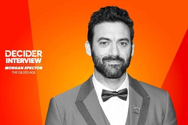 Morgan Spector in black and white on a bright orange background