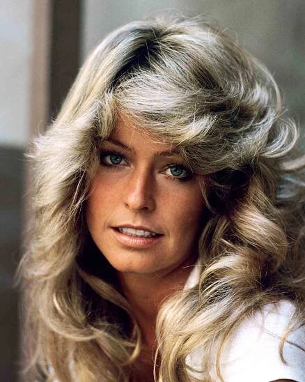 Farrah Fawcett wears a '70s haircut
