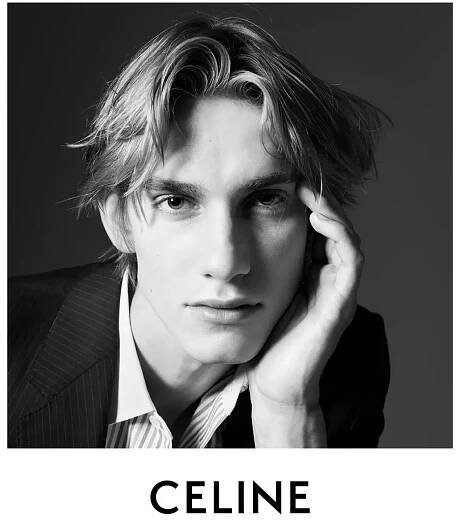 Sitting for a portrait, Levon Hawke wears Celine.