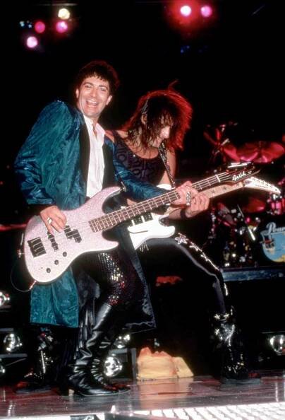 American musician, and the former bassist for the band Bon Jovi, Alec John Such, and rock guitarist best known as the lead guitarist for Bon Jovi, Richie Sambora, perform during the Slippery When Wet Tour, on March 10, 1987, at Cobo Arena in Detroit, MI.