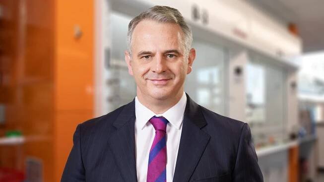 Wrexham University awards John Moses Honorary Fellowship