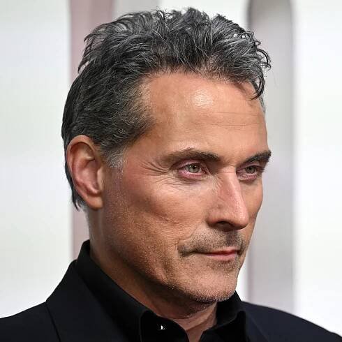 Rufus Sewell: Textured Widow's Peak Hairstyle 11