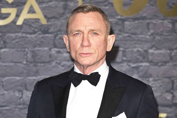 Daniel Craig attends a photocall for "60 Years of James Bond" on November 23, 2022 in London, England. 