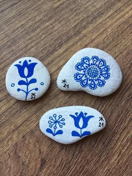 Stone Flooring with Blue and White Painted Rocks