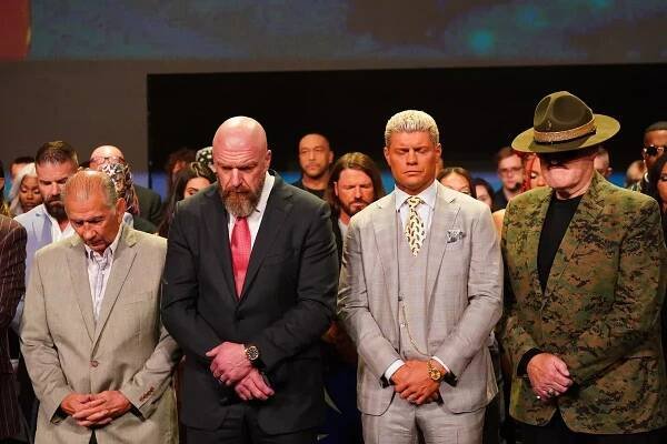  Triple H with Gerald Brisco, Cody Rhodes, Sgt. Slaughter and the rest of the WWE locker room mourn the loss of Hulk Hogan