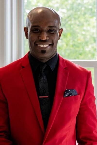 dr-kevin-chapman-red-suit