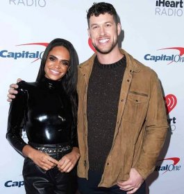 Michelle Young, Clayton Echard arrives at the 102.7 KIIS FM's Jingle Ball 2021 Presented By Capital One at The Forum on December 03, 2021 in Inglewood, California.