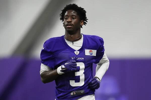 Minnesota Vikings football player in uniform.