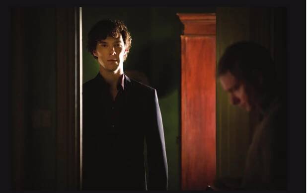 Sherlock (PBS) TV Series Season 3. 2014. Shown from left: Benedict Cumberbatch (as Sherlock Holmes), Martin Freeman (as Dr. John Watson). Photo courtesy of PBS/Photofest.  Scholarship on Holmes has long rec- ognized the centrality of Watson’s trust to an appreciation of the stories. As early as 1925, Viktor Shklovsky saw Watson playing a dual role as the narra- tor who “tells us about Sherlock Holmes and conveys to us his expectation of the latter’s decision, while he himself is not privy to the detective’s mental process” (104) and as an “eternal fool” (104) to the often reticent Holmes. Both Christopher Metress and James Krasner complicate this reading: Metress ex- plores Watson’s complicity in guarding Holmes’s stories, telling them only with the sleuth’s consent, and thus “lead[ing] he double life of detective and dip- omat” (45). Metress is thinking here about “The Second Stain” (1904), but his argument is equally applicable to the rest of the canon (45). Krasner, on the other hand, hones in on Watson’s “frus- trated desire to behold and comprehend that detecting” (425), shifting the blame from Watson to Holmes—‘Holmes ei-   her does not speak, or will not explain” 425)—and this frustration from Watson to us (432-33). Recent work on Holmes has drawn links between the narrative strategies of Conan Doyle’s stories, how they figure in adaptations such as Sherlock (2010-—), and the social and political climates in which they were produced and on which they closely reflected. Ellen Burton Harrington, for instance, reveals how Sherlock employs Conan Doyle’s stories “about social or- der and invites a kind of Victorian nos-   For Harrington, Sherlock allays some of our contemporary fears by “allow- ing us to enjoy Sherlock’s rivalry with Moriarty and the satisfying way that this representative villain might be chal- lenged and potentially defeated” (73). Conversely, Darcie Rives-East has ar- gued that the perils represented in Sher- lock are politicized: the series, “like its nineteenth-century counterpart responds to the ongoing British middle class fear of the Other based on race, class, and gender” (44). Sherlock’s popularity owes much to the British public’s anxi- eties, following the 7/7 attacks, “regard- ing its government’s ability to contain and contend with threats, foreign and domestic, to the British nation” (Rives- East 44). The powers of “all-seeing and  